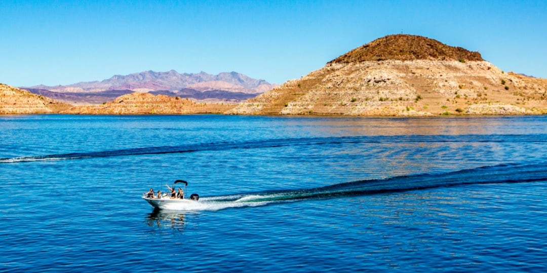 A speedboat and jet ski out on Lake Mohave