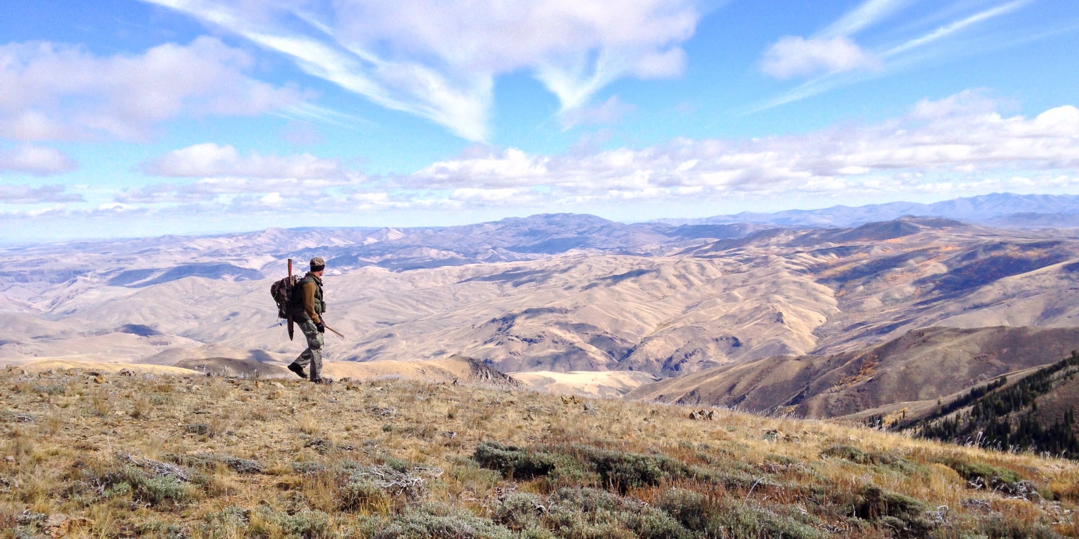 Hunter looking out at vast Nevada landscape.